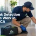 Leak detection technician using a moisture meter to inspect water damage in an Encino, CA home.